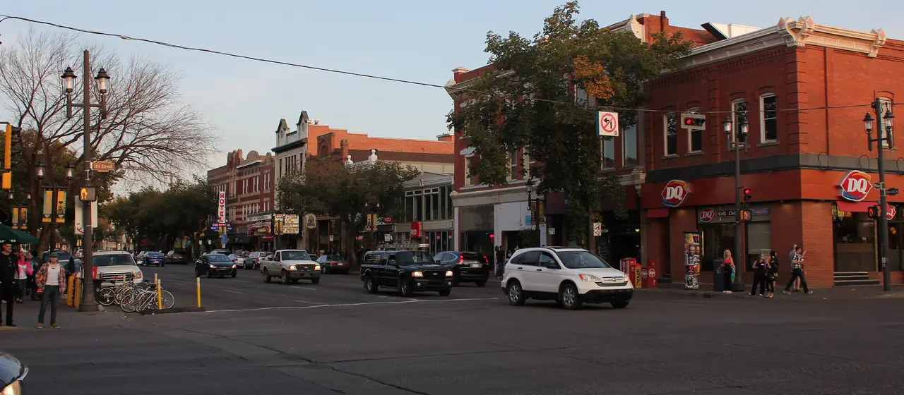 Historic brick buildings and shops along Whyte Avenue in Old Strathcona, Edmonton