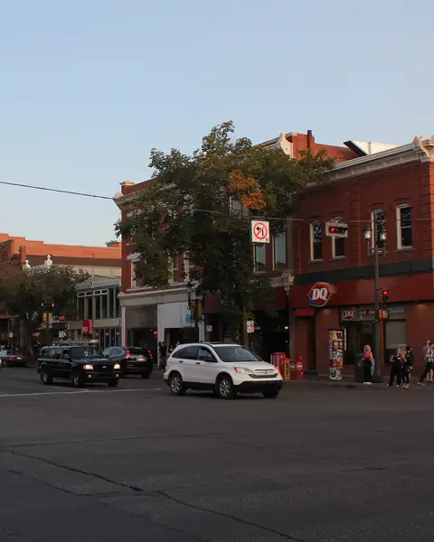 Historic brick buildings and shops along Whyte Avenue in Old Strathcona, Edmonton